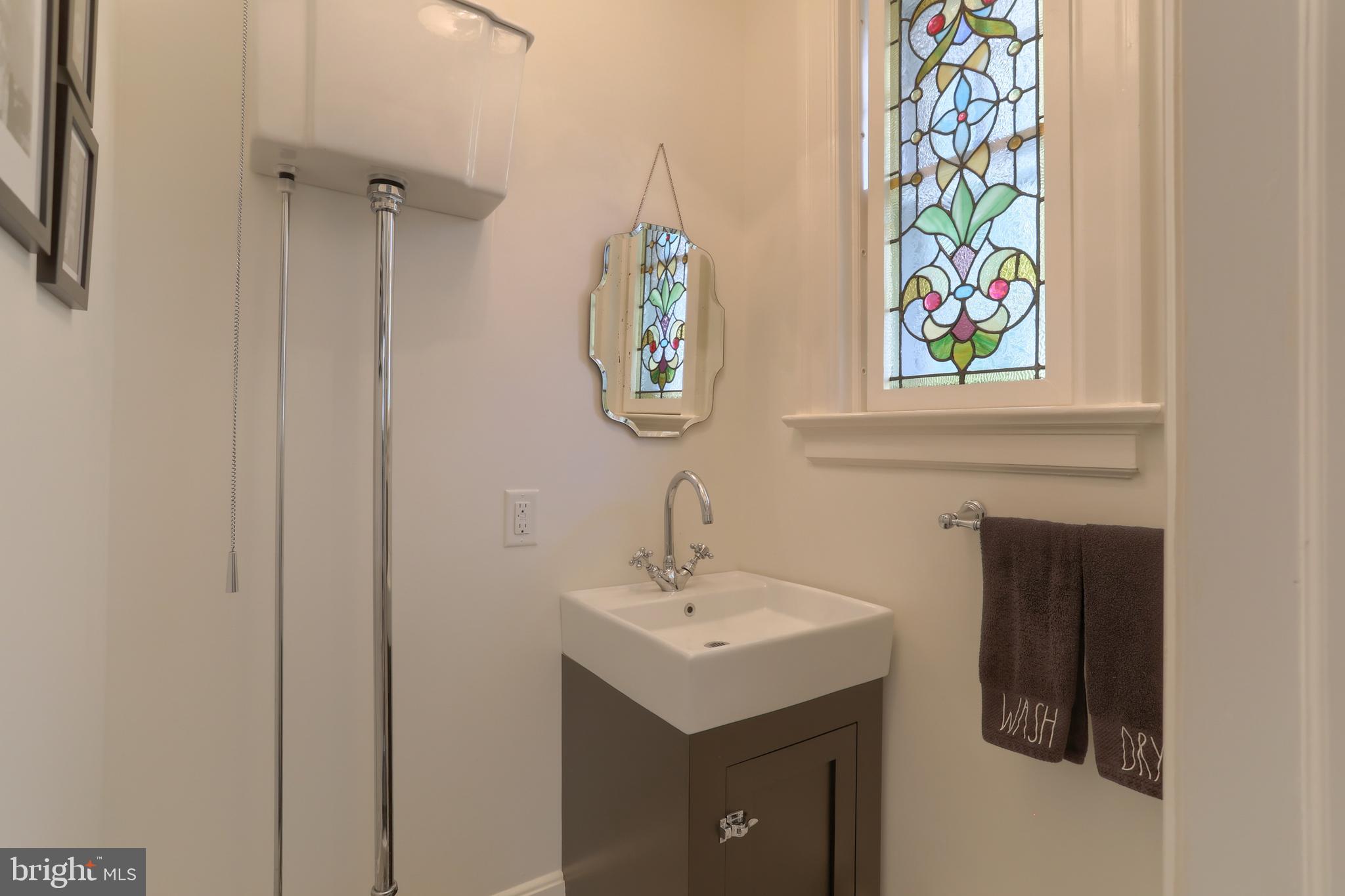 118 Elm Avenue Hershey, PA 17033 - Photo 20 of 54 a bathroom with a sink and a mirror