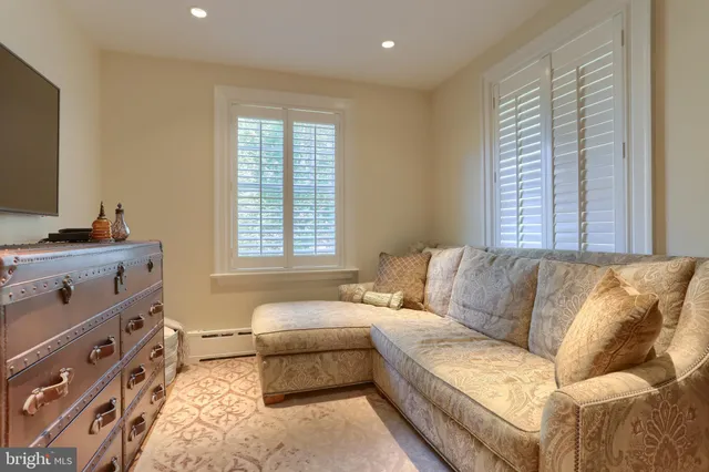 a spacious bathroom with sinks mirror and a bathtub
