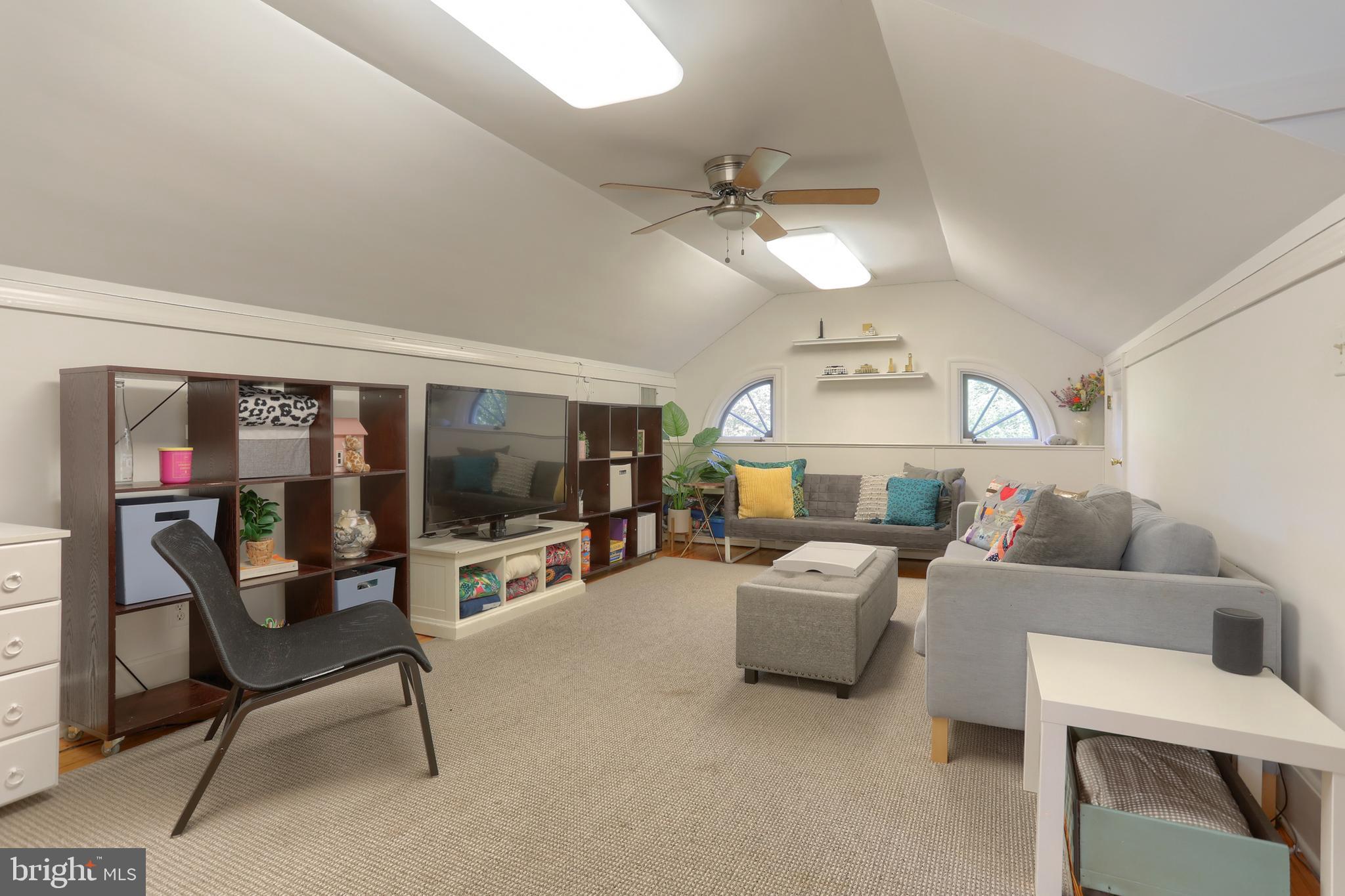 118 Elm Avenue Hershey, PA 17033 - Photo 36 of 54 a living room with furniture and a flat screen tv