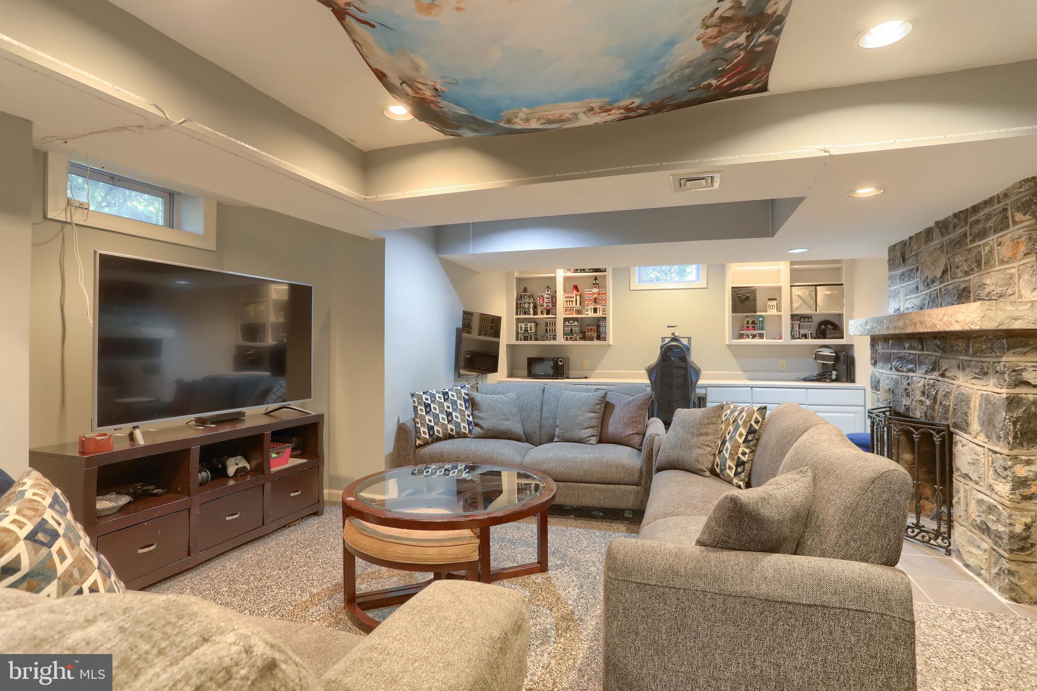 118 Elm Avenue Hershey, PA 17033 - Photo 38 of 54 a living room with fireplace furniture and a flat screen tv