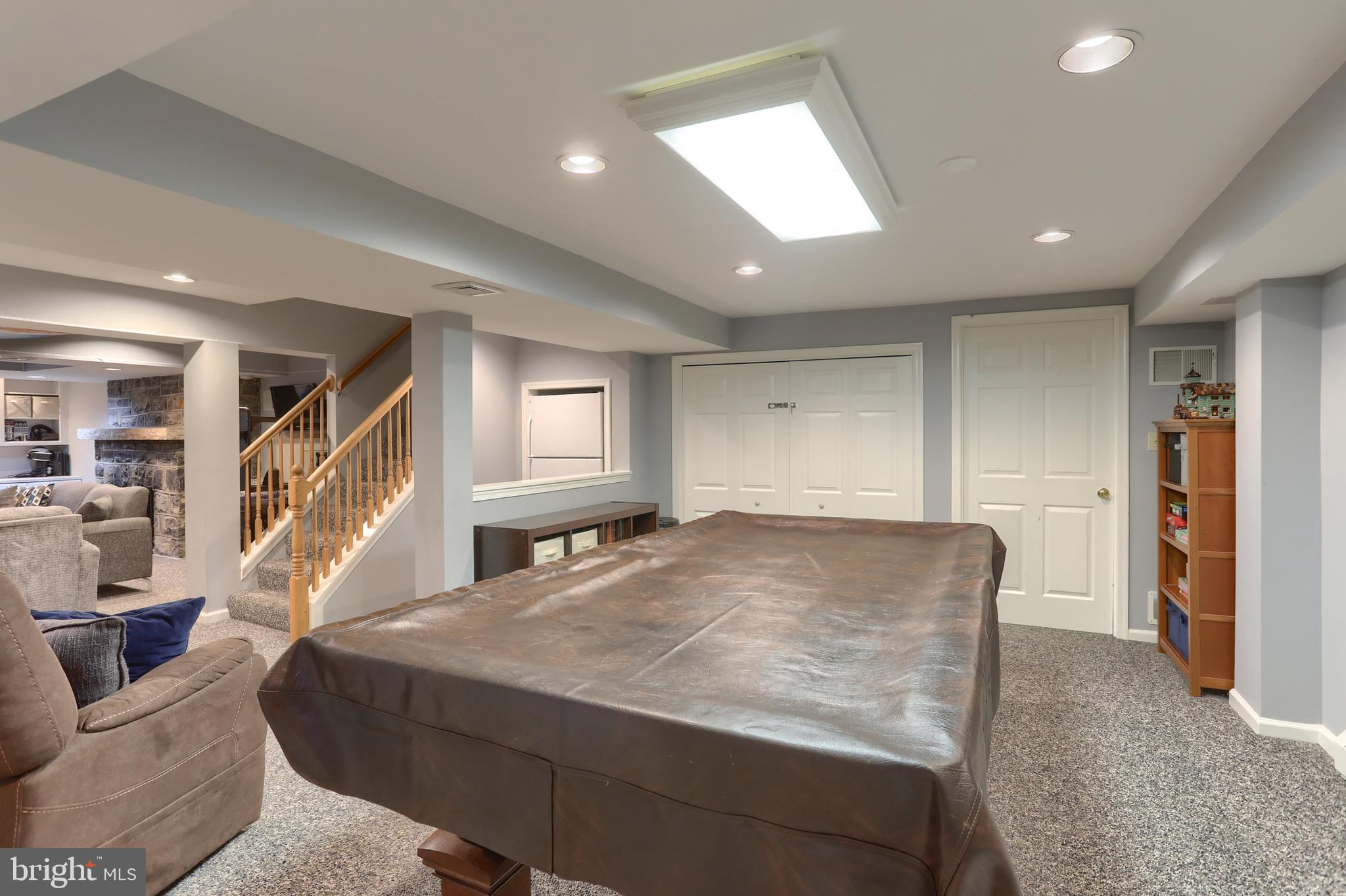 118 Elm Avenue Hershey, PA 17033 - Photo 42 of 54 a living room with furniture and stairs