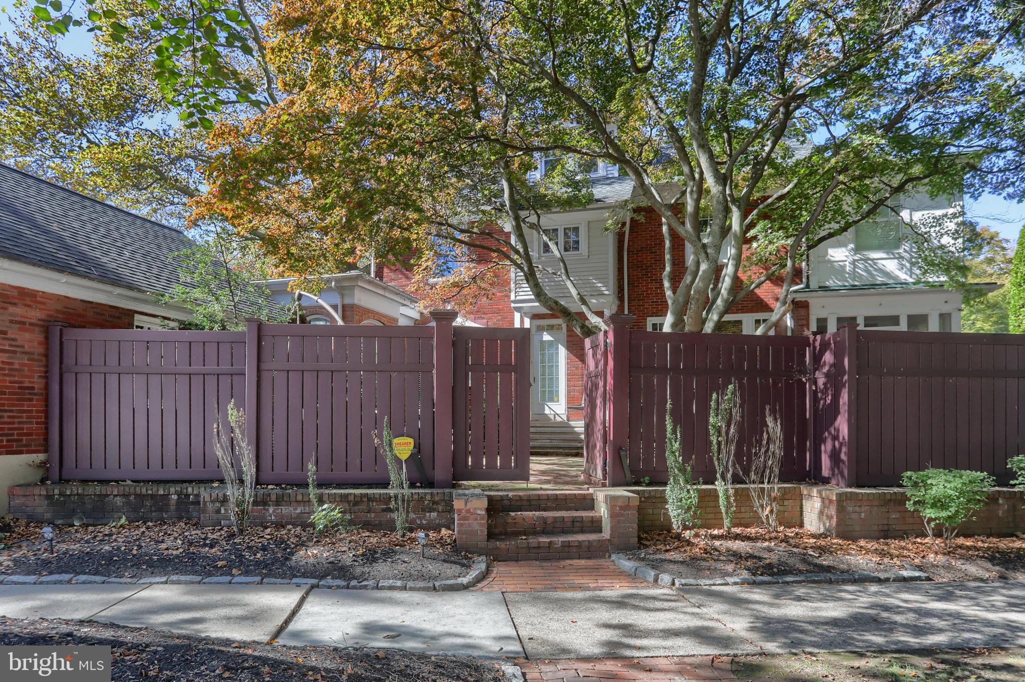 118 Elm Avenue Hershey, PA 17033 - Photo 52 of 54 a view of a house with a tree and wooden fence