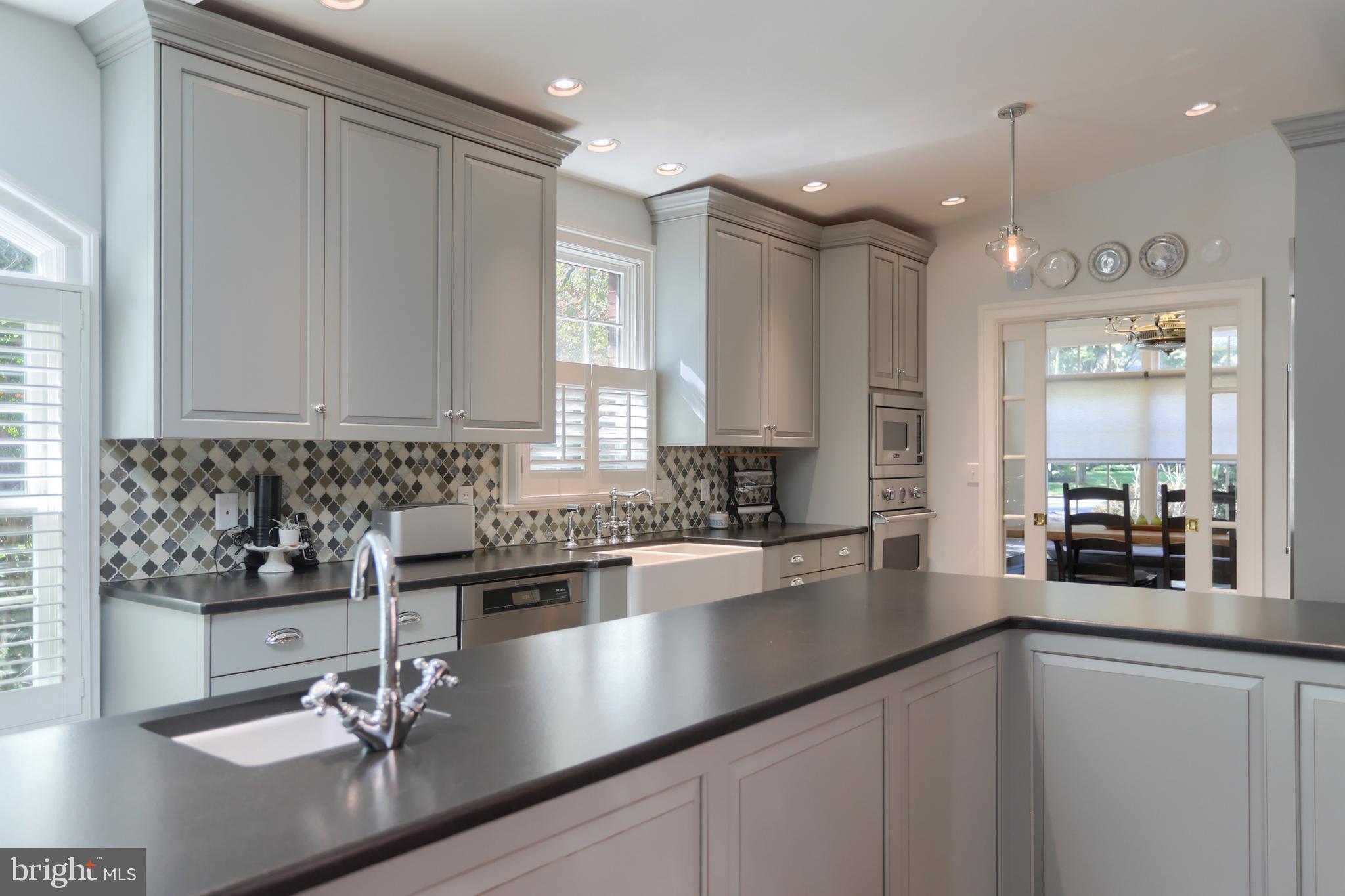 118 Elm Avenue Hershey, PA 17033 - Photo 10 of 54 a kitchen with a sink and center island