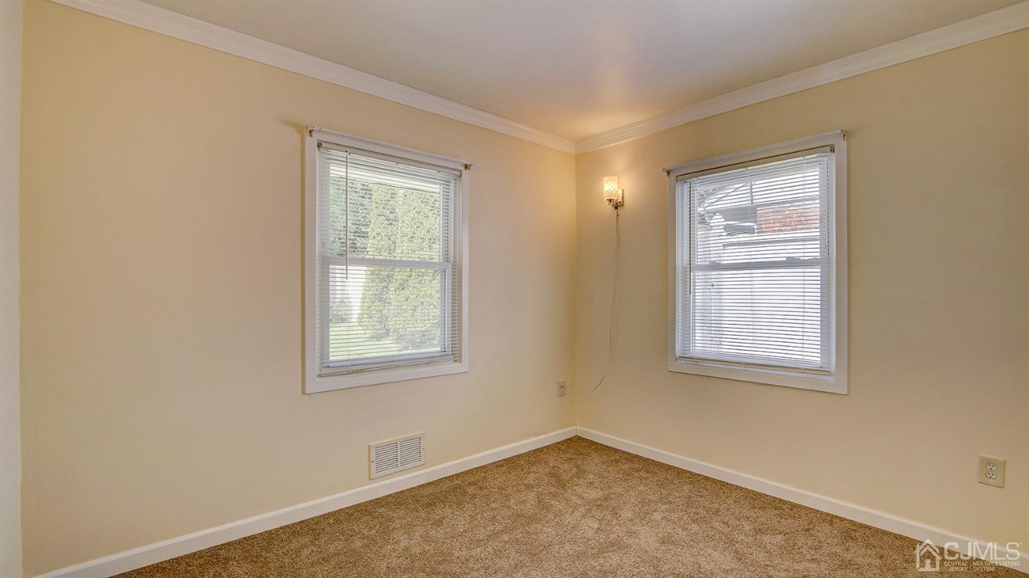 10 Melville Road Edison, NJ 08817 - Photo 12 of 32 an empty room with a window