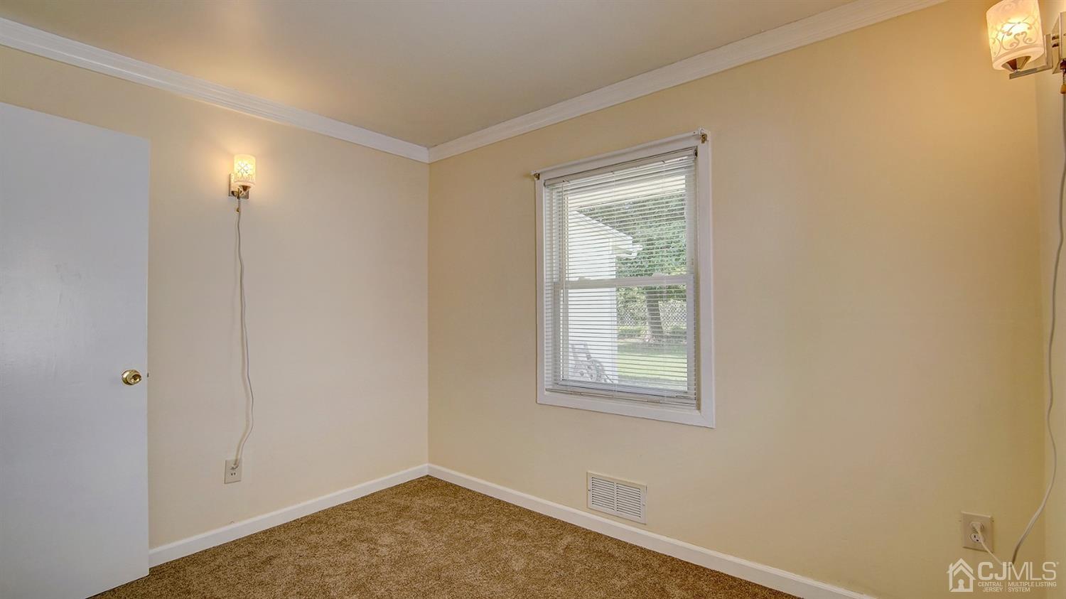 10 Melville Road Edison, NJ 08817 - Photo 13 of 32 an empty room with windows