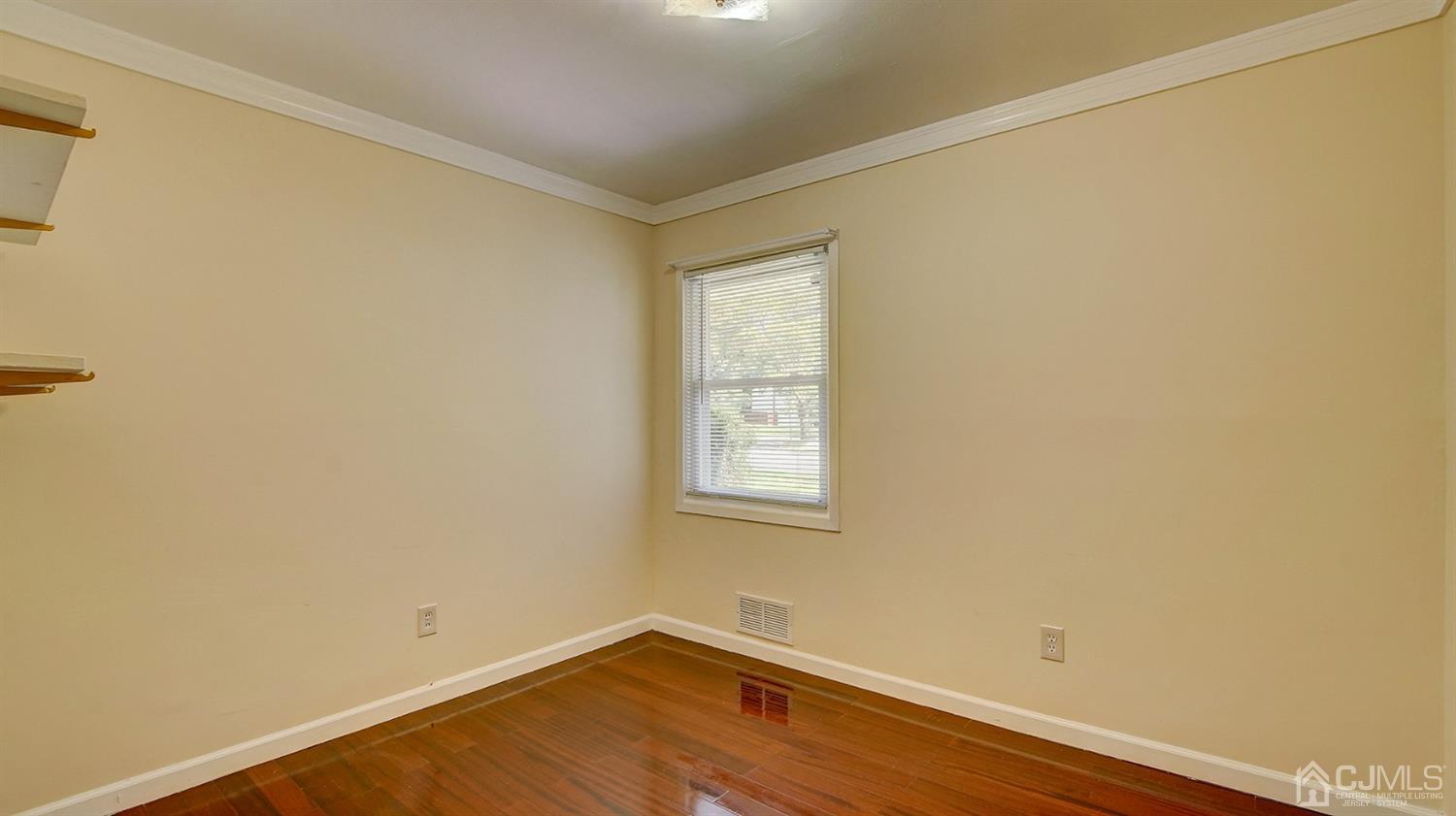 10 Melville Road Edison, NJ 08817 - Photo 19 of 32 an empty room with a window