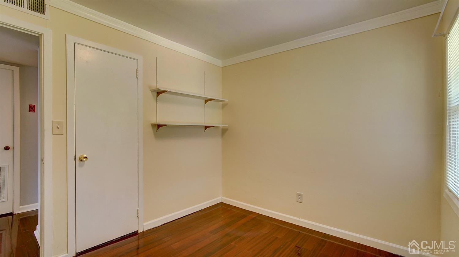 10 Melville Road Edison, NJ 08817 - Photo 20 of 32 a view of a room with wooden floor