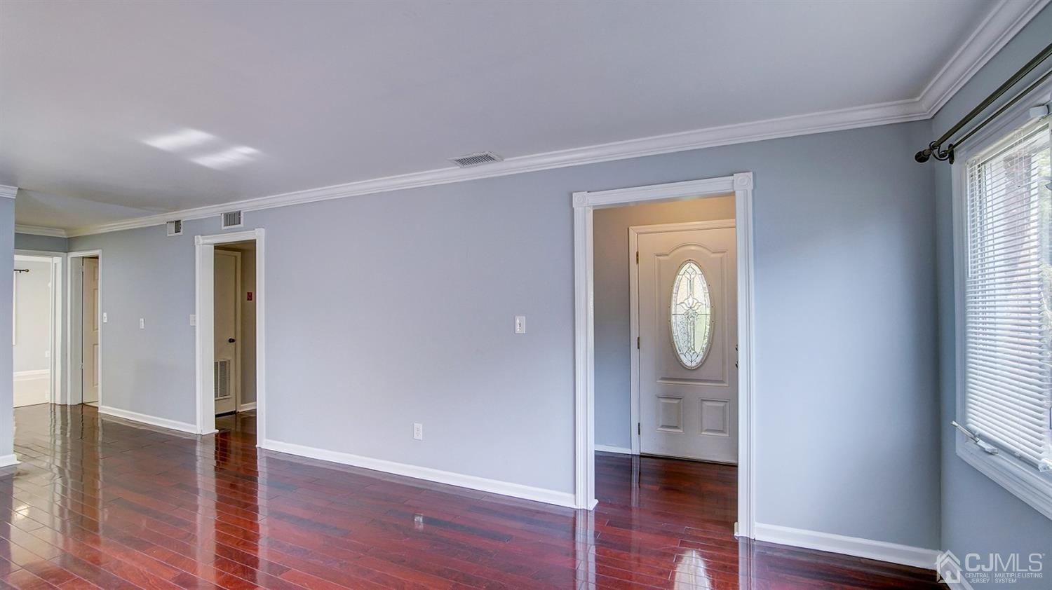 10 Melville Road Edison, NJ 08817 - Photo 25 of 32 a view of a hallway with wooden floor