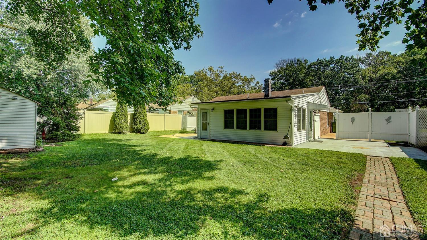 10 Melville Road Edison, NJ 08817 - Photo 30 of 32 a front view of a house with a yard