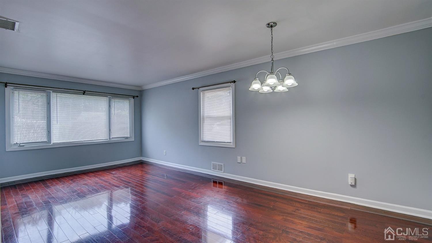 10 Melville Road Edison, NJ 08817 - Photo 7 of 32 a view of a room with window and wooden floor