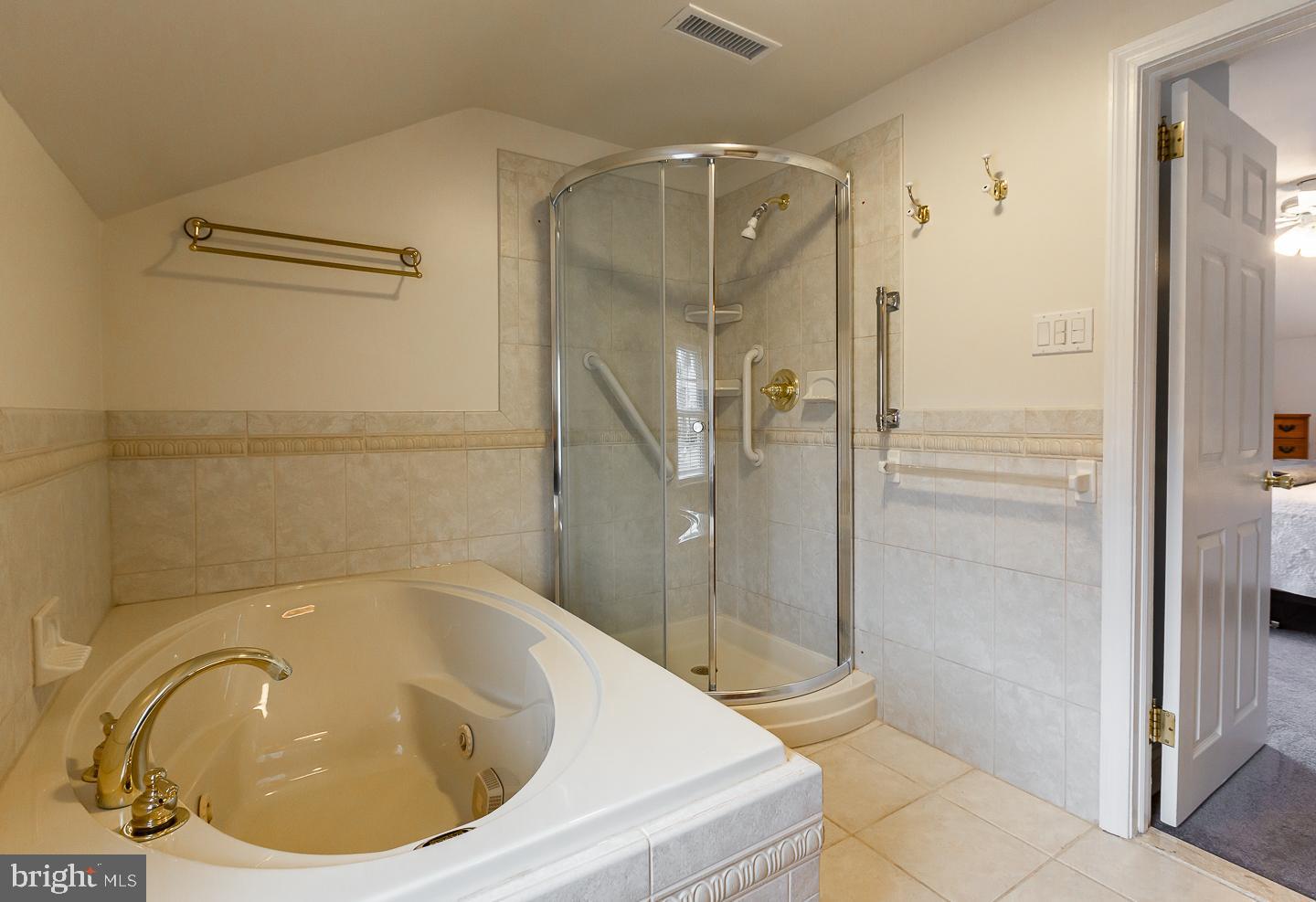 2717 Prescott Road Havertown, PA 19083 - Photo 25 of 49 a bathroom with a tub and shower