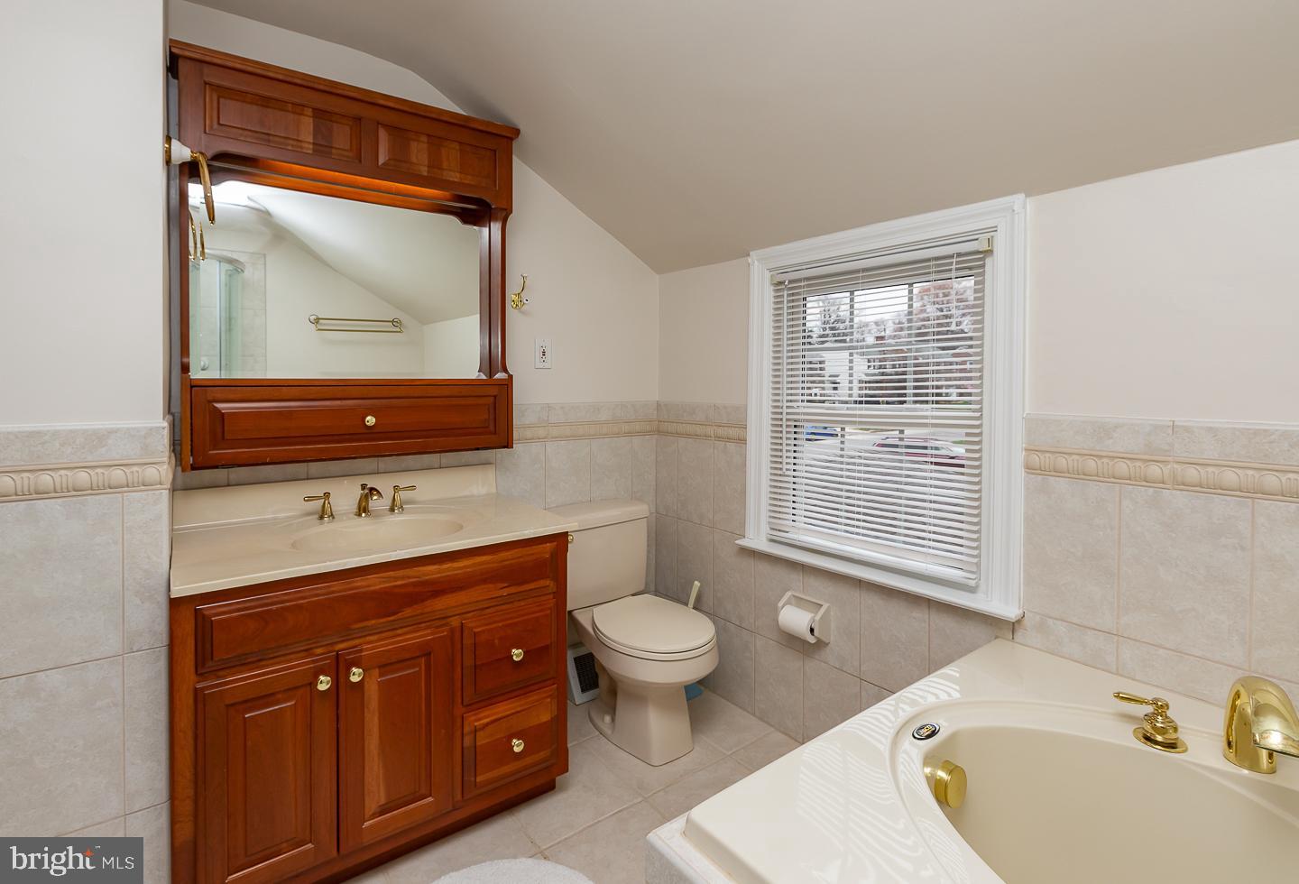 2717 Prescott Road Havertown, PA 19083 - Photo 26 of 49 a bathroom with a toilet sink and mirror