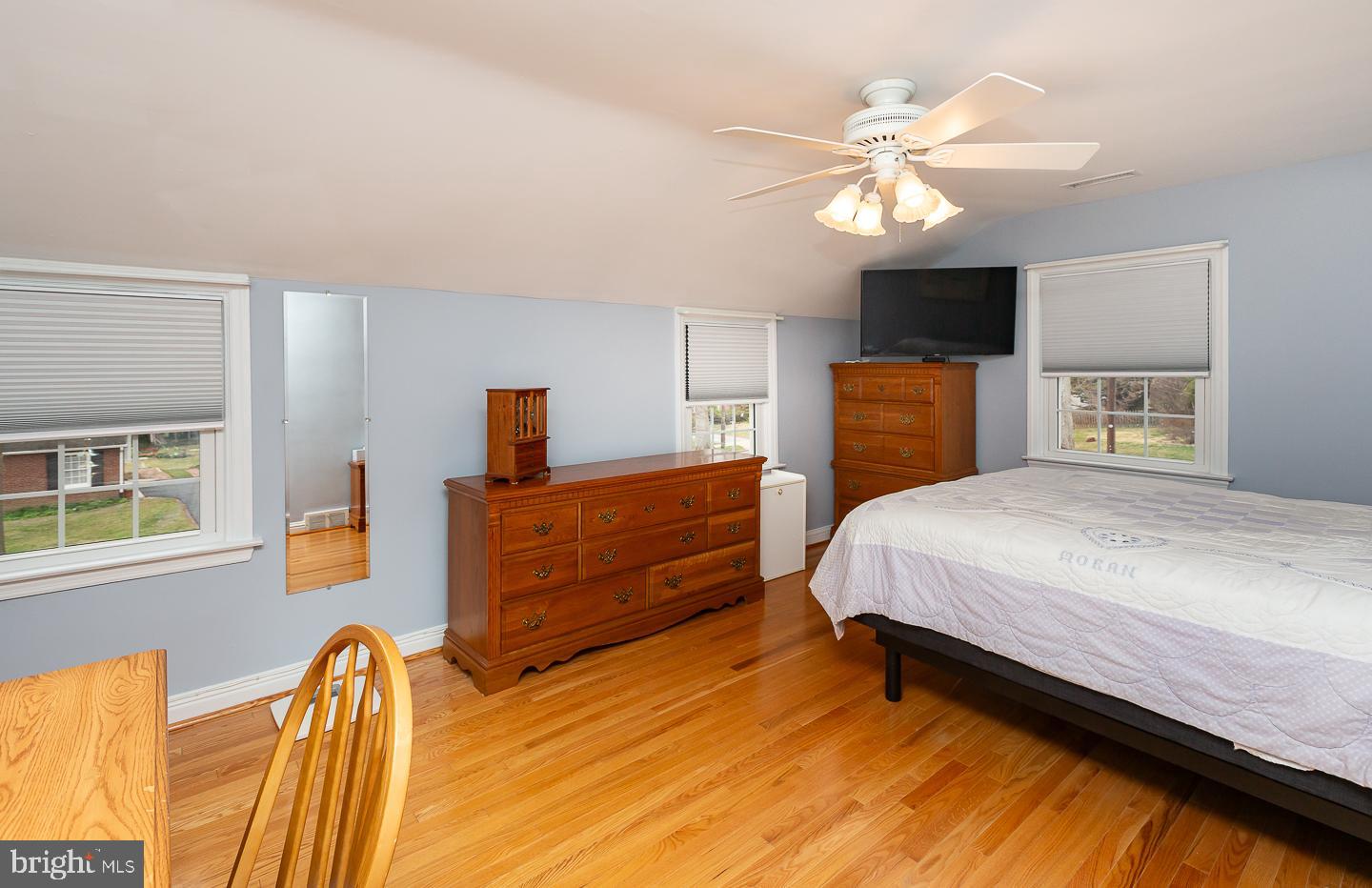 2717 Prescott Road Havertown, PA 19083 - Photo 27 of 49 a bed room with a bed and a chandelier