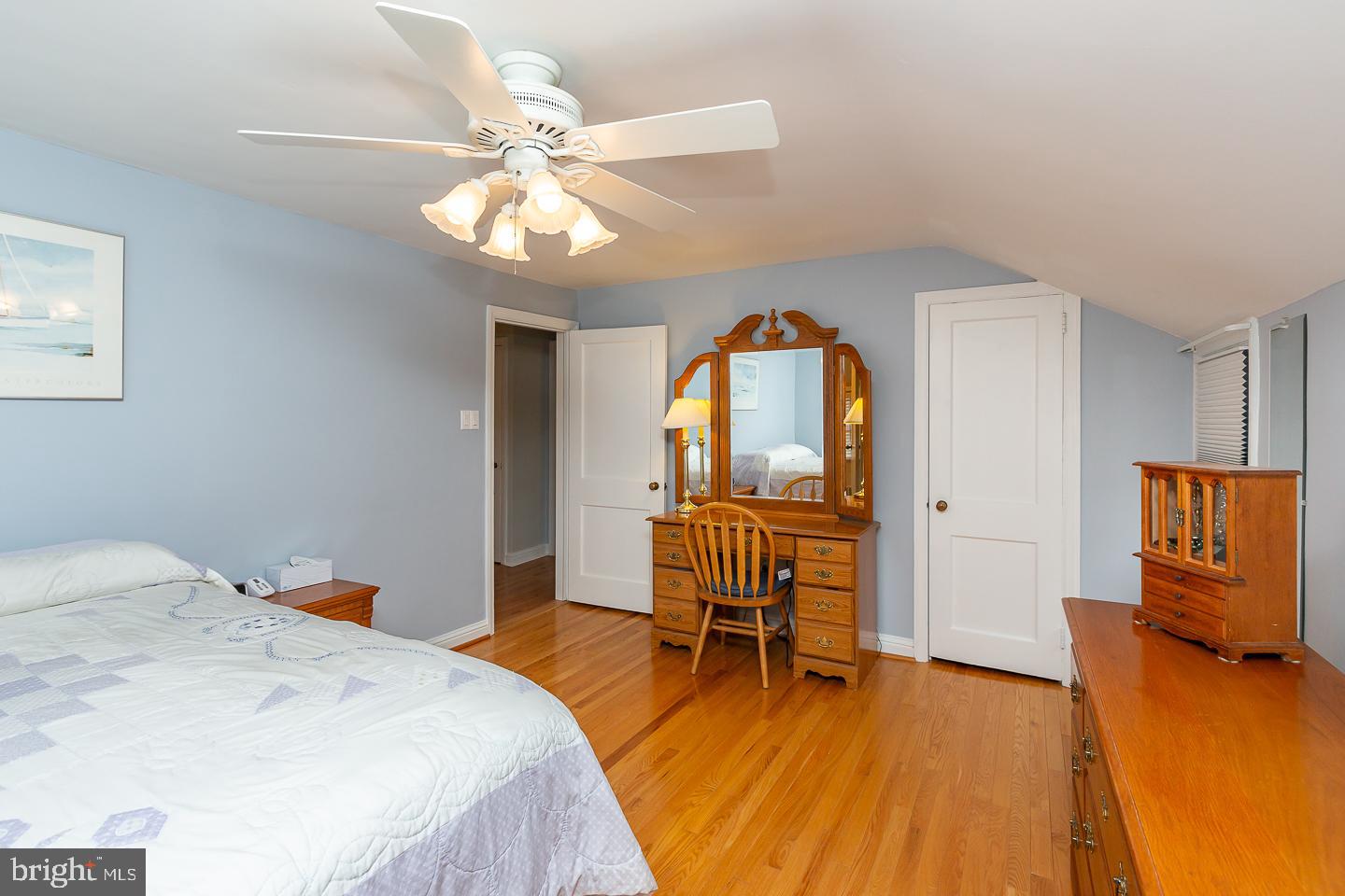 2717 Prescott Road Havertown, PA 19083 - Photo 29 of 49 a bedroom with a bed and wooden floor