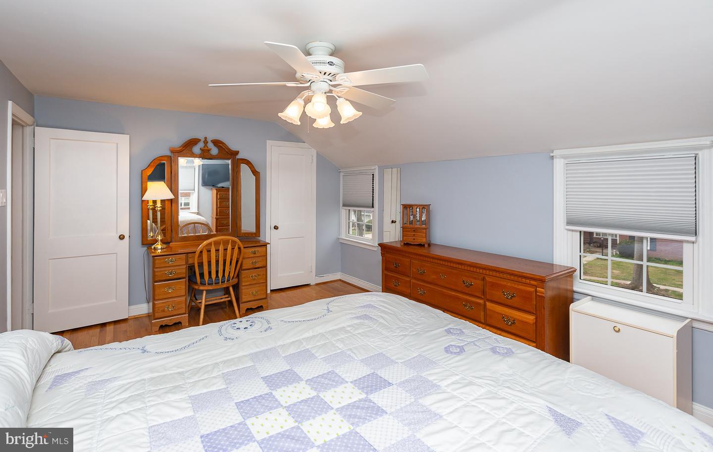 2717 Prescott Road Havertown, PA 19083 - Photo 30 of 49 a bedroom with a bed and a chandelier