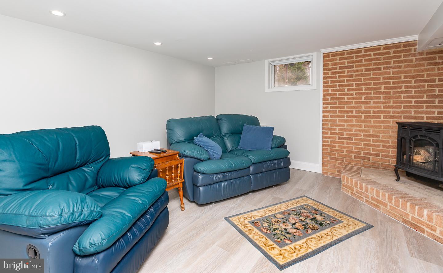 2717 Prescott Road Havertown, PA 19083 - Photo 37 of 49 a living room with furniture and a fireplace