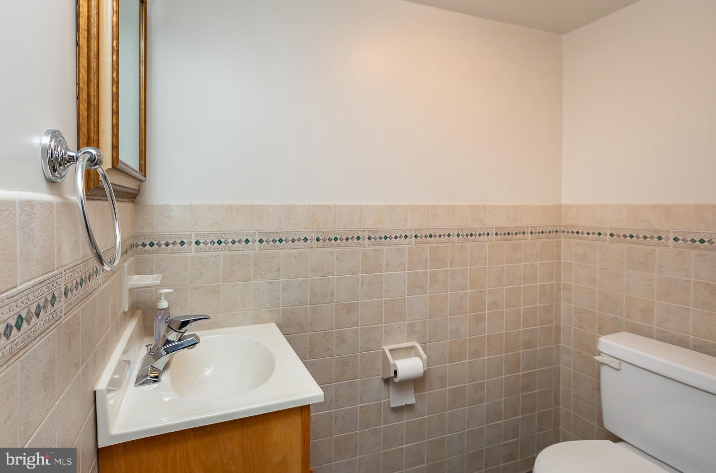 2717 Prescott Road Havertown, PA 19083 - Photo 39 of 49 a bathroom with a sink a toilet and a mirror