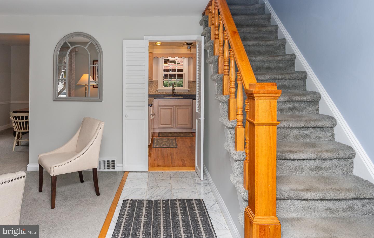 2717 Prescott Road Havertown, PA 19083 - Photo 7 of 49 a view of a staircase with wooden floor and a rug