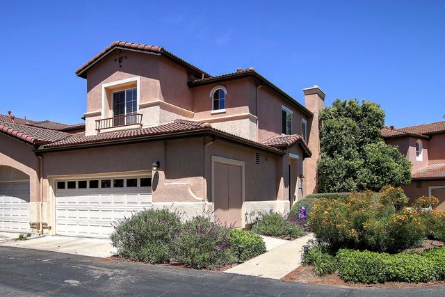 a house view with a outdoor space