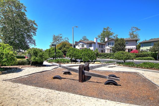 a lawn chairs sitting in the middle of a park