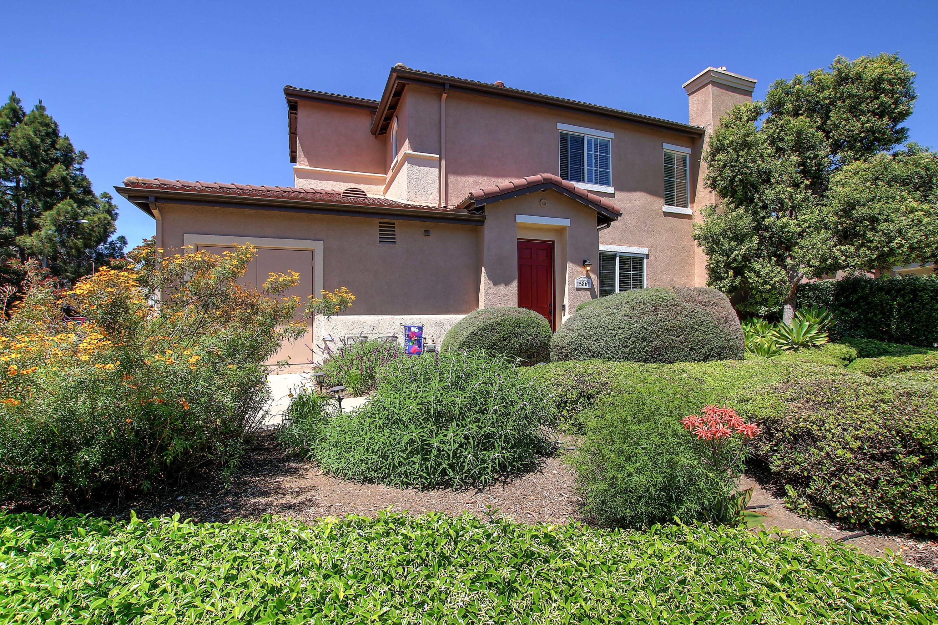 586 Poppyfield Place Goleta, CA 93117 - Photo 3 of 37 a front view of house with yard and green space