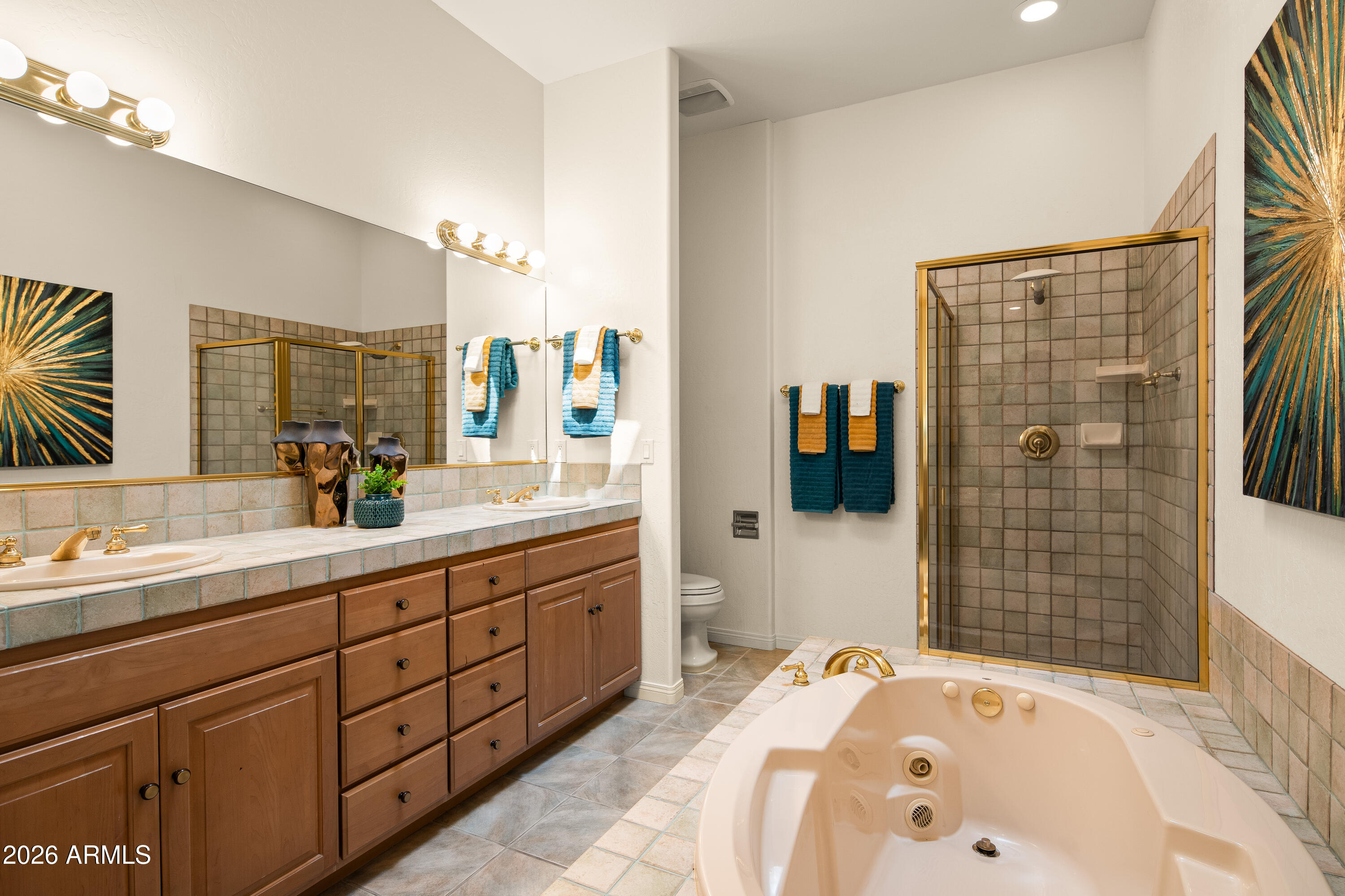 39 Rim Trail Circle Sedona, AZ 86351 - Photo 23 of 41 a bathroom with a tub sink and mirror