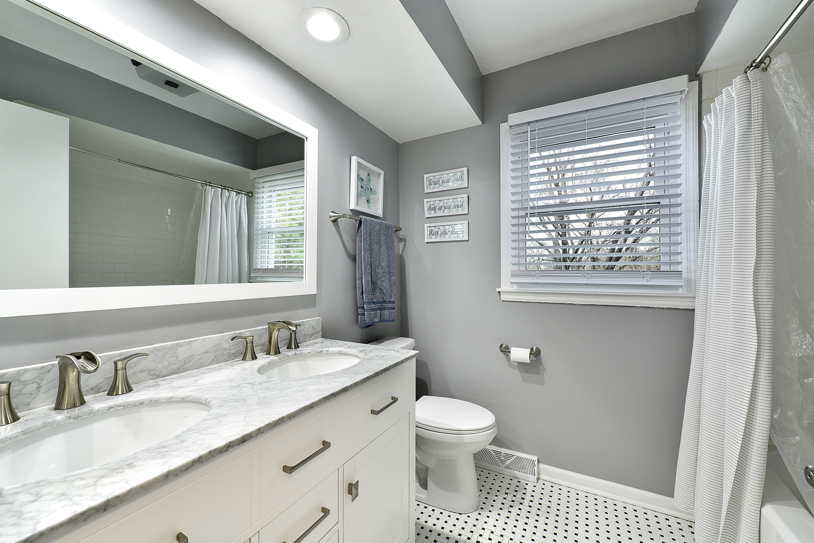 317 Roberts Road Inverness, IL 60067 - Photo 15 of 20 a bathroom with a granite countertop sink mirror vanity and a toilet