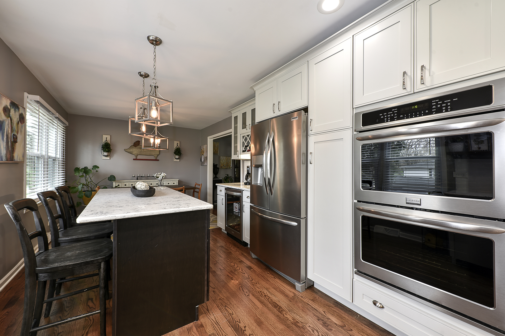 317 Roberts Road Inverness, IL 60067 - Photo 4 of 20 a kitchen with stainless steel appliances a stove microwave and refrigerator