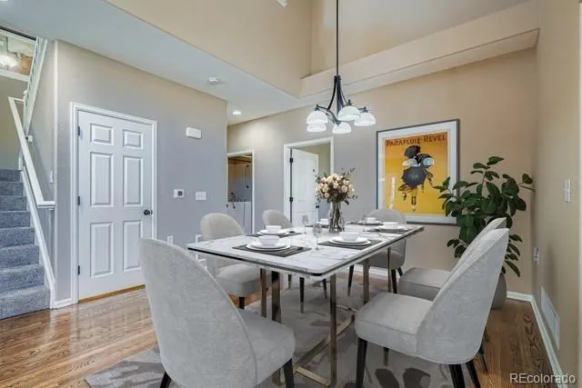 a view of livingroom with hardwood floor and a ceiling fan