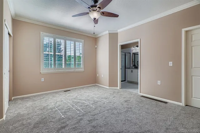 a bathroom with a double vanity sink mirror and shower
