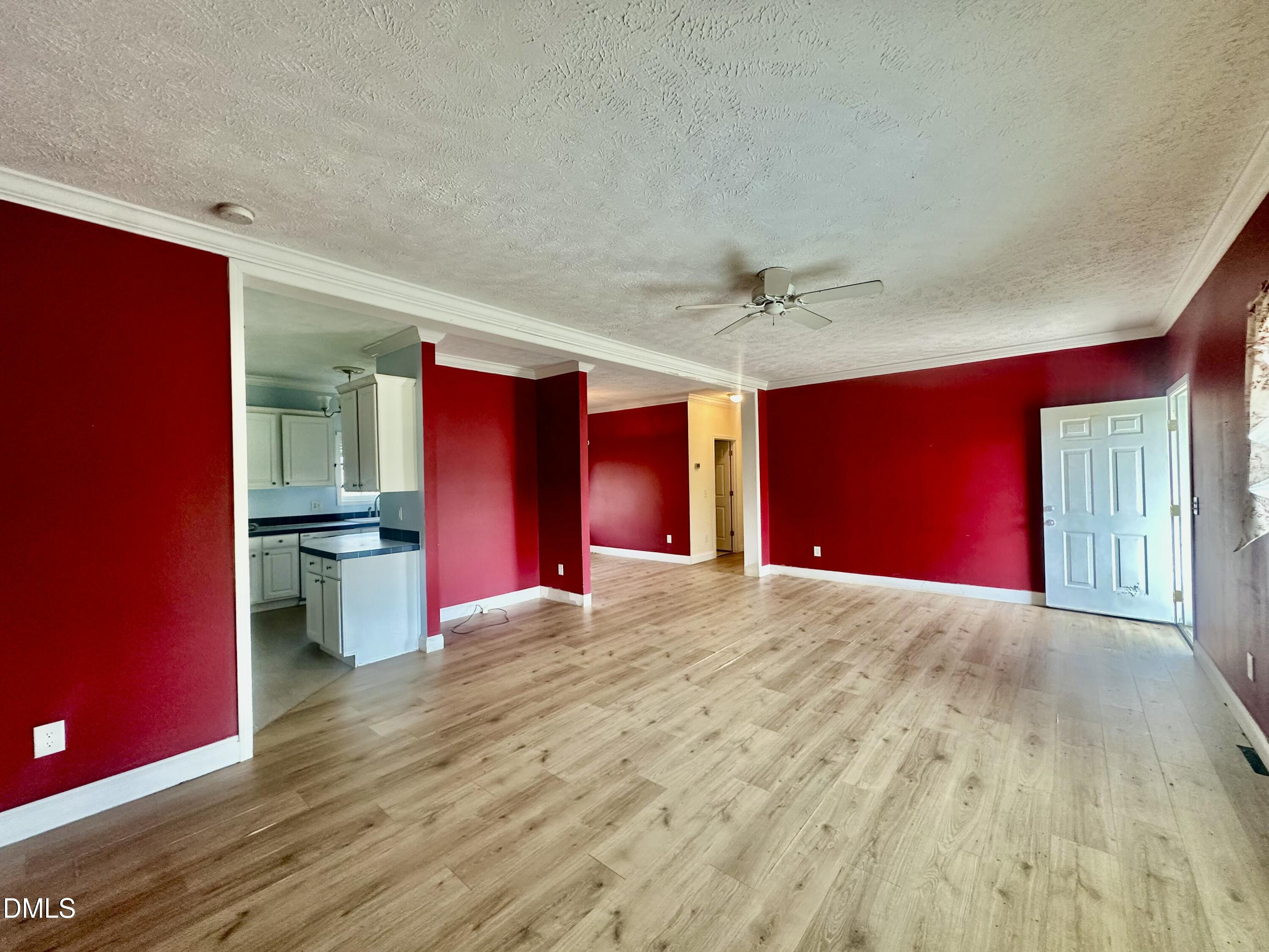 155 Collin Drive Roxboro, NC 27574 - Photo 5 of 20 a view of an empty room with a window