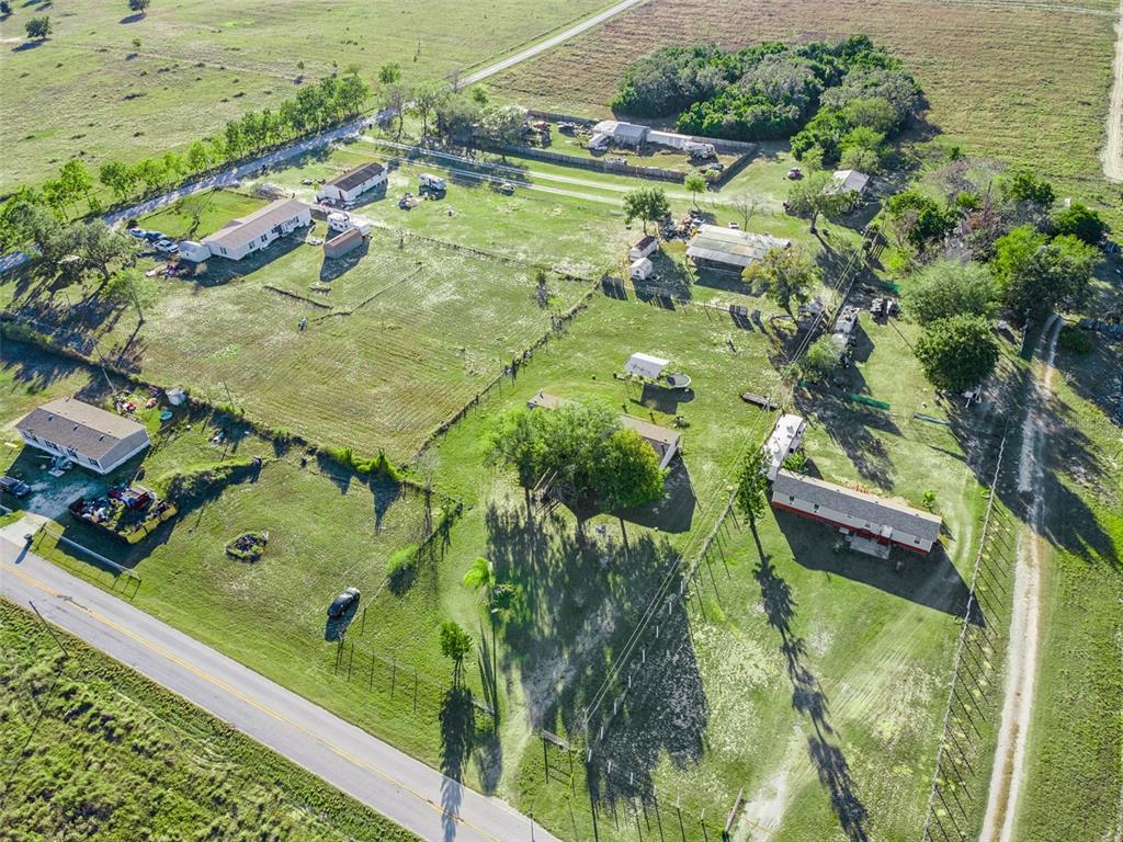 1477 Alford Road Haines City, FL 33844 - Photo 36 of 41 an aerial view of a residential houses with outdoor space