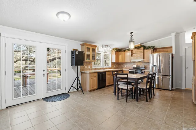 a view of a dining room kitchen and a window
