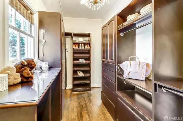 a view of kitchen with furniture and wooden floor