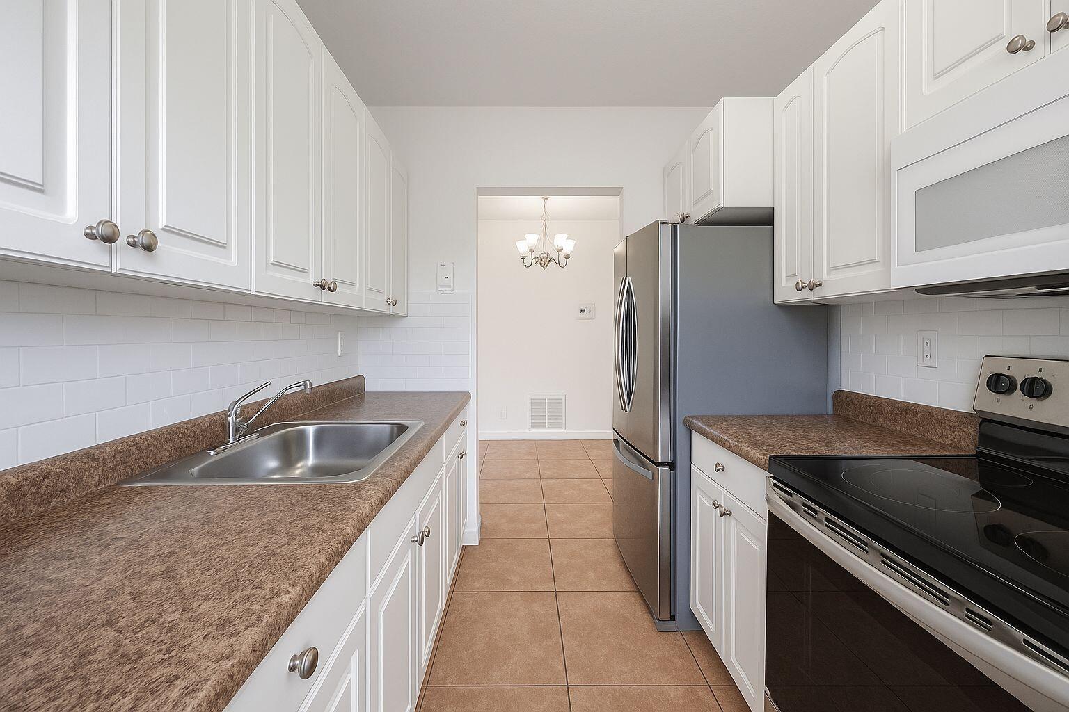 1671 Northeast 33rd Street, Unit 8 Pompano Beach, FL 33064 - Photo 2 of 16 10