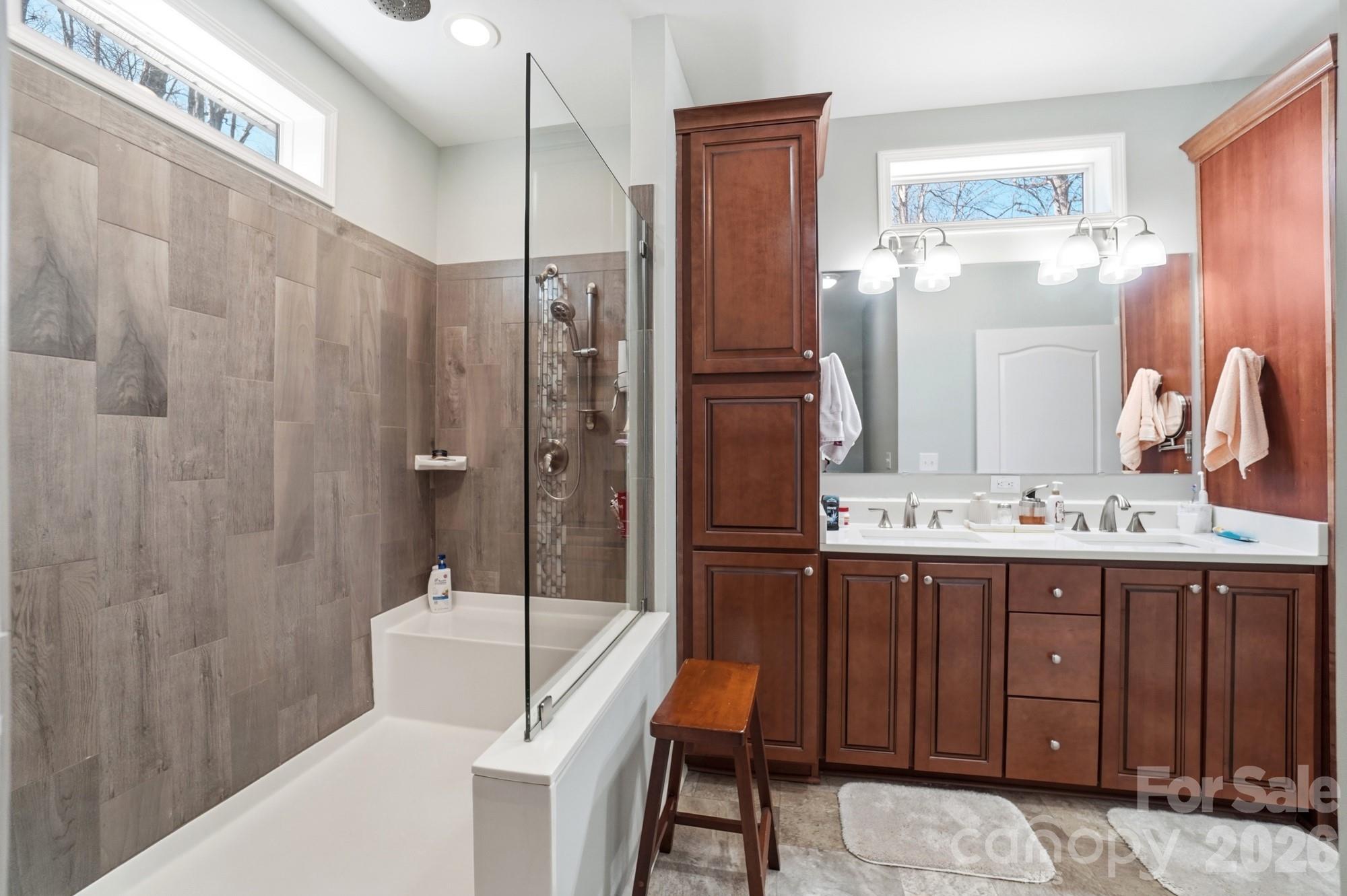4363 Grace Church Road Newton, NC 28658 - Photo 19 of 30 a bathroom with a sink a toilet and shower