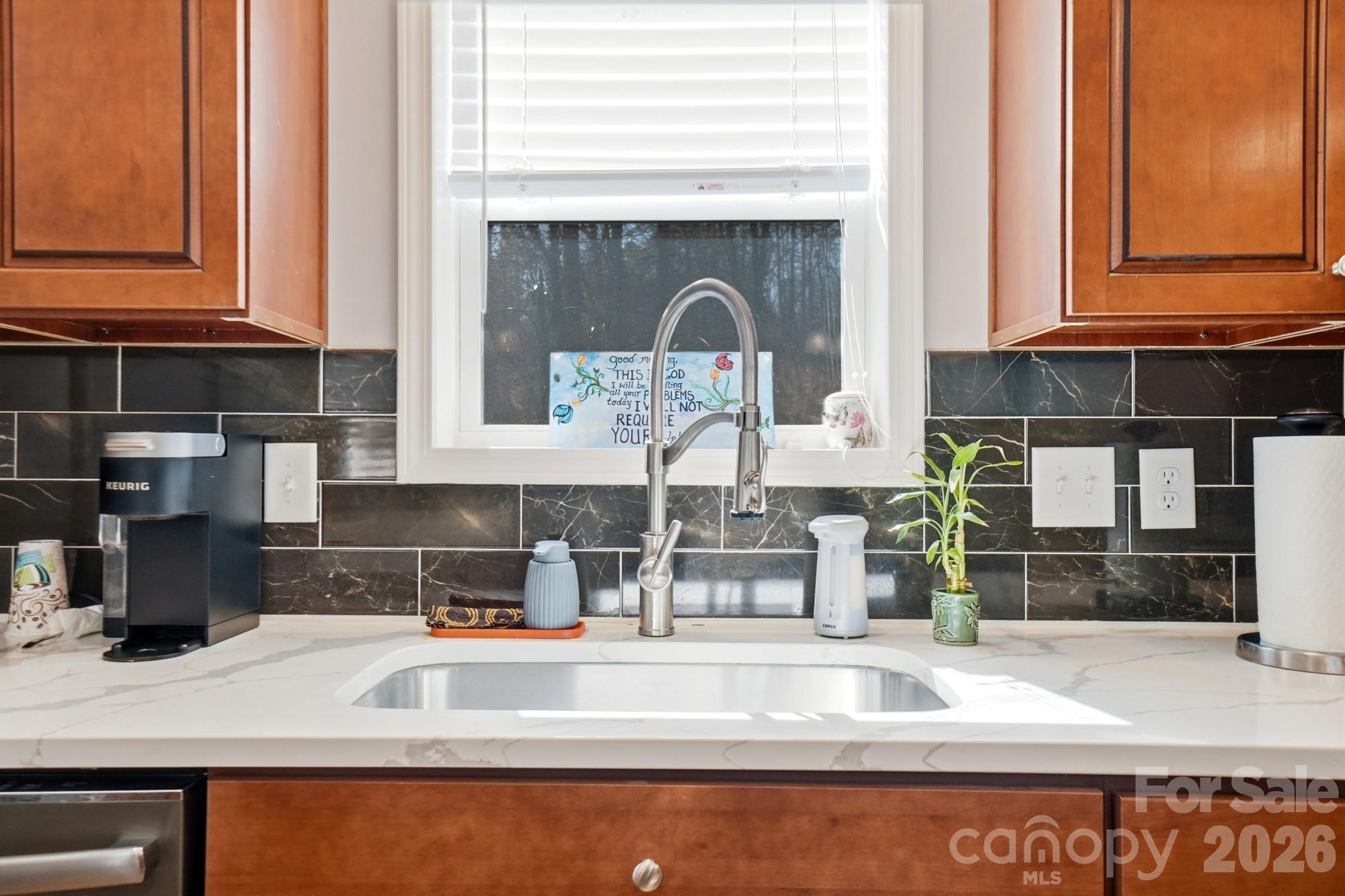 4363 Grace Church Road Newton, NC 28658 - Photo 9 of 30 a kitchen with a sink and a microwave