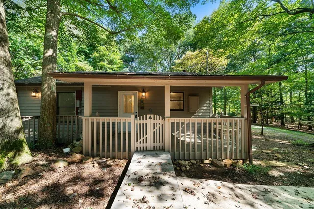 a view of a house with a small yard