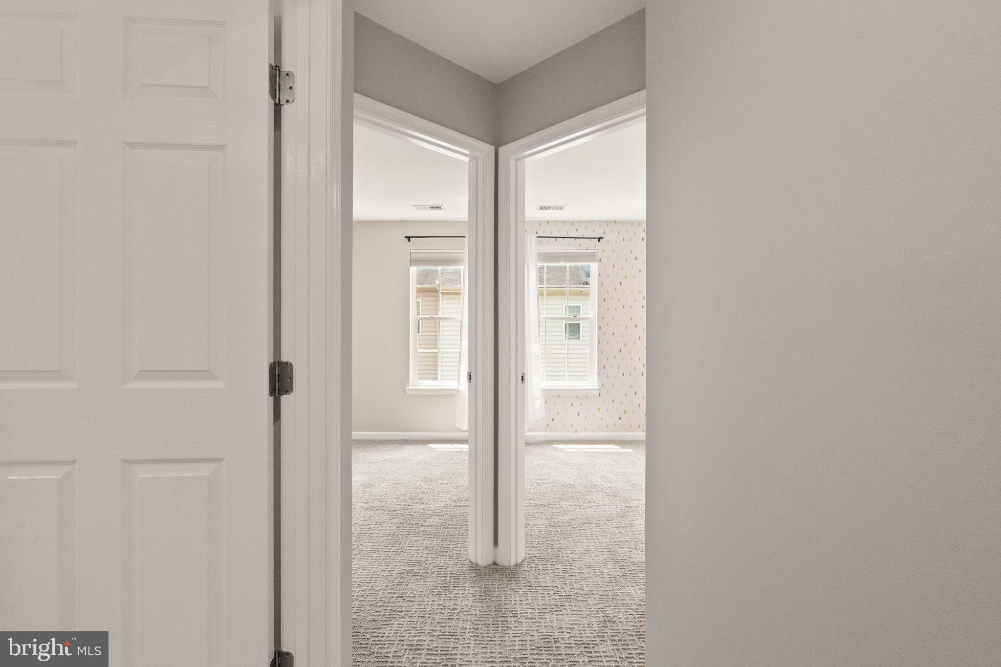 7015 Trek Way Gainesville, VA 20155 - Photo 29 of 56 Privacy door to 2nd and 3rd bedrooms
