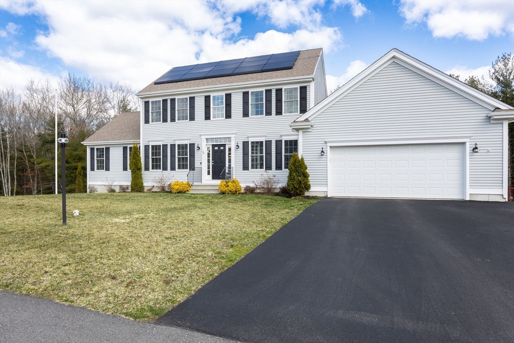 55 Oldfield Road Bridgewater, MA 02324 - Photo 2 of 35 a front view of a house with garden