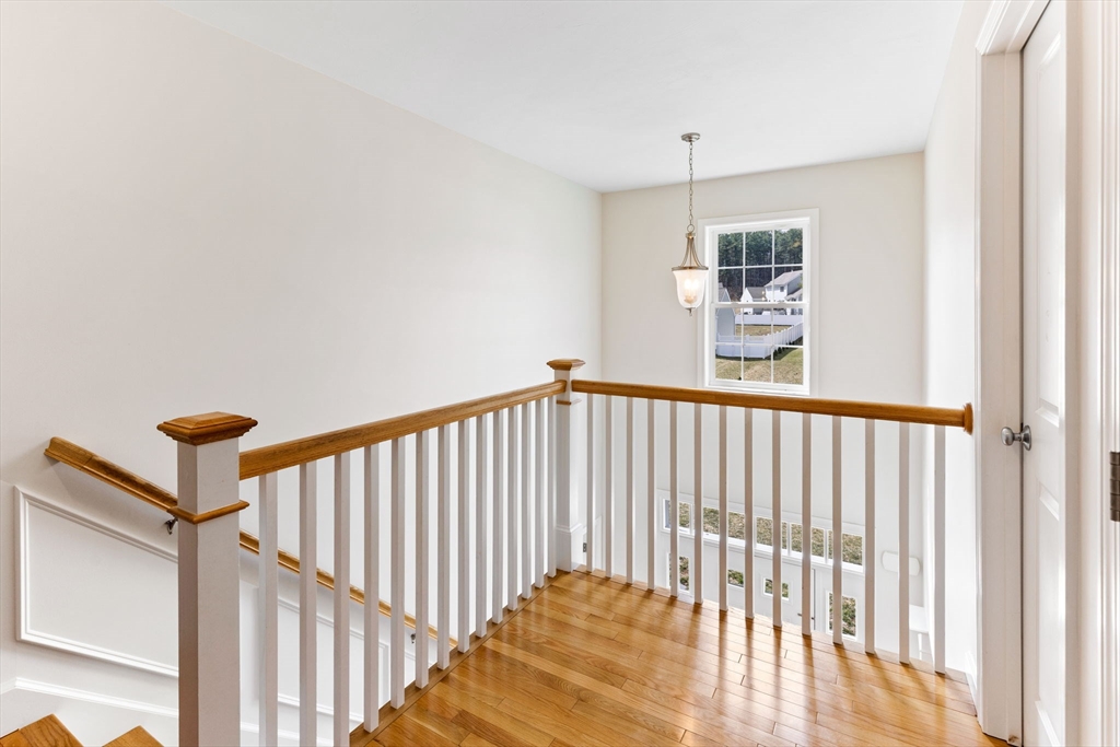 55 Oldfield Road Bridgewater, MA 02324 - Photo 23 of 35 a view of a hallway with windows