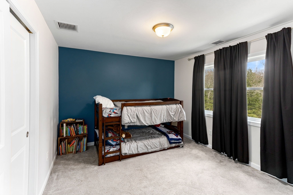 55 Oldfield Road Bridgewater, MA 02324 - Photo 32 of 35 a bedroom with a bed and a window