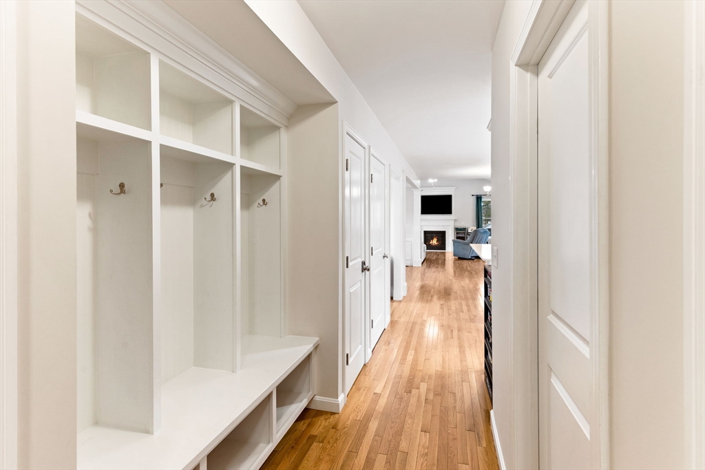 55 Oldfield Road Bridgewater, MA 02324 - Photo 5 of 35 a view of a hallway with wooden floor and staircase