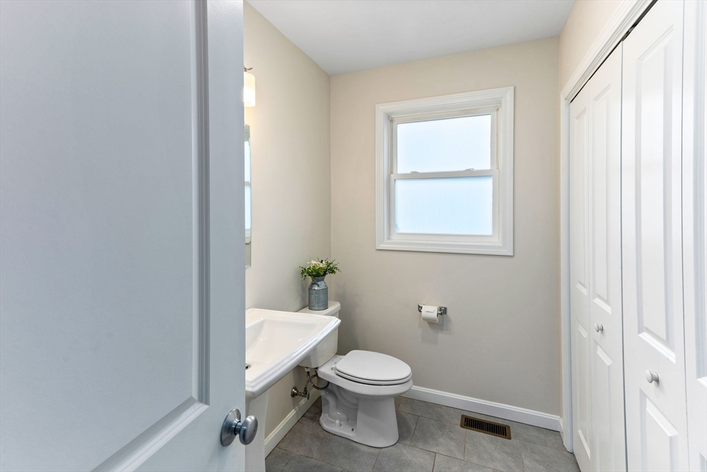55 Oldfield Road Bridgewater, MA 02324 - Photo 7 of 35 a bathroom with a toilet a sink and window