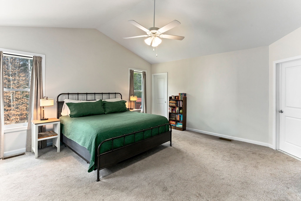 55 Oldfield Road Bridgewater, MA 02324 - Photo 8 of 35 a bedroom with a bed and a ceiling fan