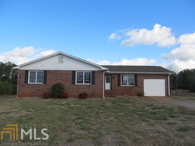 3559 Hamilton Road LaGrange, GA 30241 - Photo 1 of 1 a front view of house with yard and trees in the background