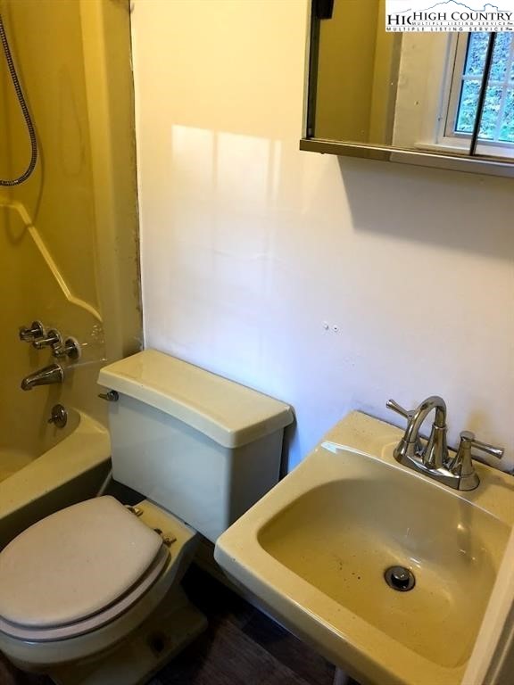 545 School House Road Whitetop, VA 24292 - Photo 24 of 44 a bathroom with a sink and a toilet