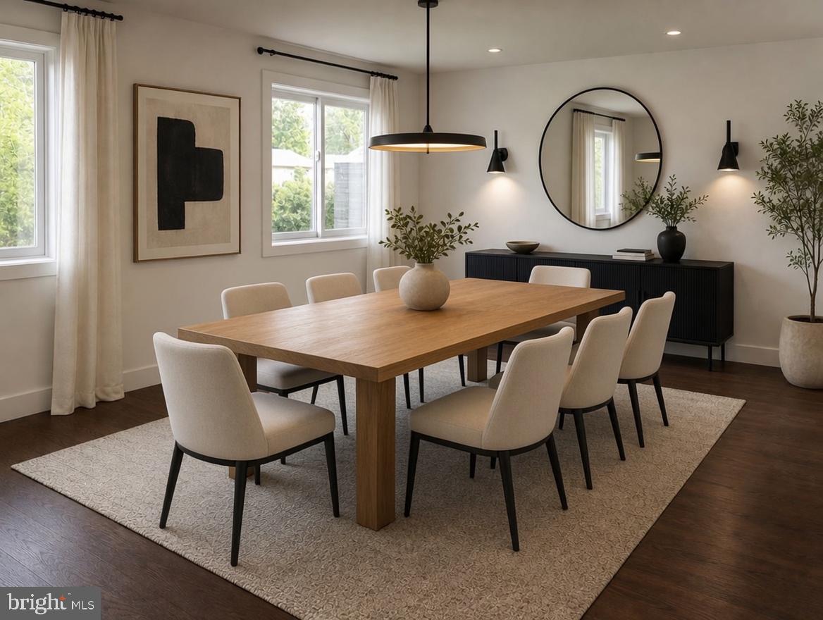 713 Woodfield Road Villanova, PA 19085 - Photo 2 of 36 a view of a dining room with furniture and wooden floor