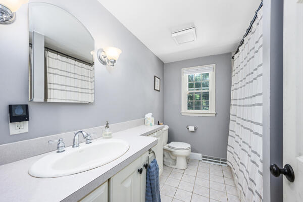 882 West Yarmouth Road Yarmouth Port, MA 02675 - Photo 18 of 36 a bathroom with a sink toilet and mirror