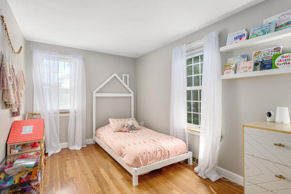 882 West Yarmouth Road Yarmouth Port, MA 02675 - Photo 19 of 36 a bedroom with a bed and a window
